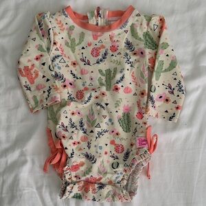 Ruffle Butts Cactus and Floral One Piece - Cream and Coral